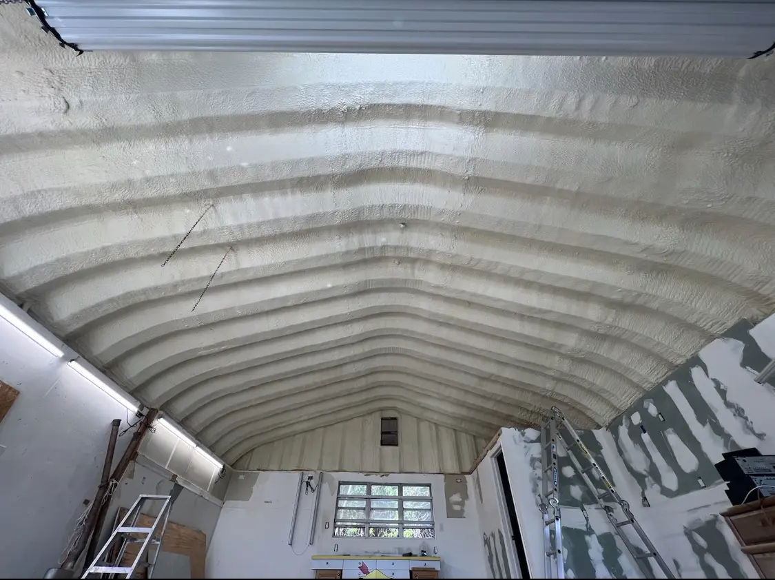 Spray polyurethane foam applied to the underside of a metal roof deck in Tarpon Springs